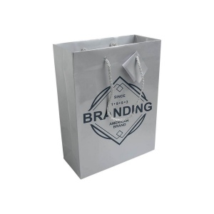 Shopper avec soufflet en carte laminée 157g/m2 avec renforcement au fond, anses en corde e 10